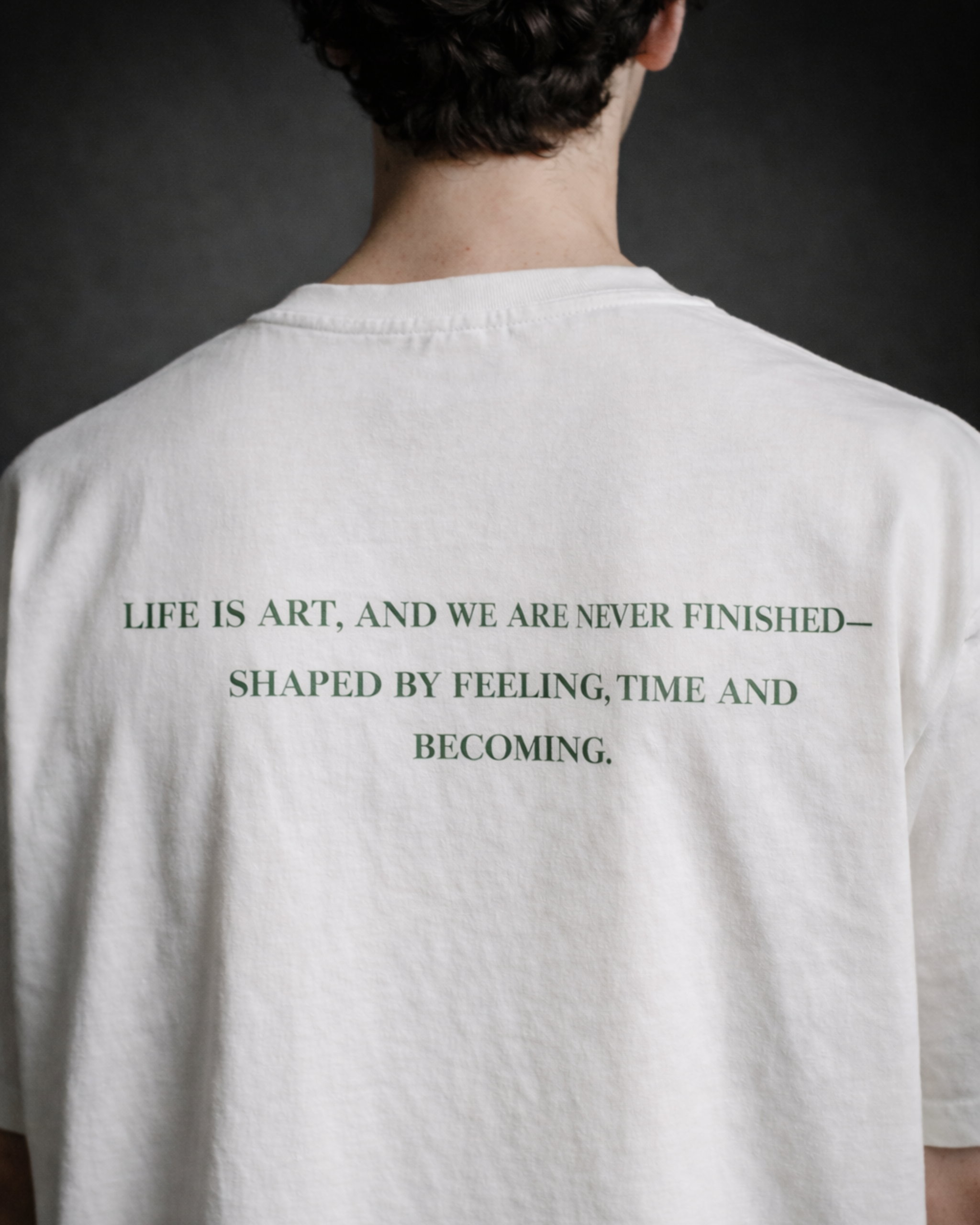 still becoming | oversized emerald on white still becoming | oversized emerald on white