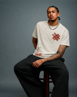 Frolics heal / repair | tape & web graphic tee red cross chest & hem mark